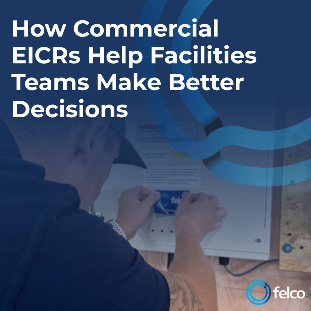 FELCO electrician reviewing a Commercial EICR with a facilities management team in a commercial building